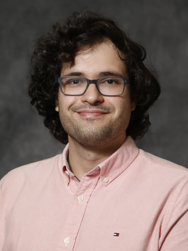 Headshot of Konur Oyman